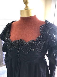 A fine quality lady's black satin, chiffon and jet trimmed Regency style evening dress with long train, lacing on jet stomacher. Ex English National Opera (unlabelled) 'Don Giovanni'